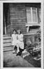 House_Front_Close_Girls_On_Porch